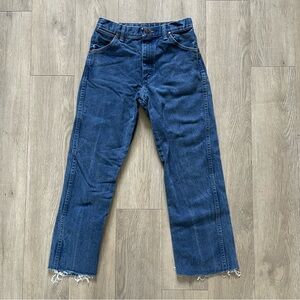 Wrangler dark wash denim jeans with raw hem. Size: 16